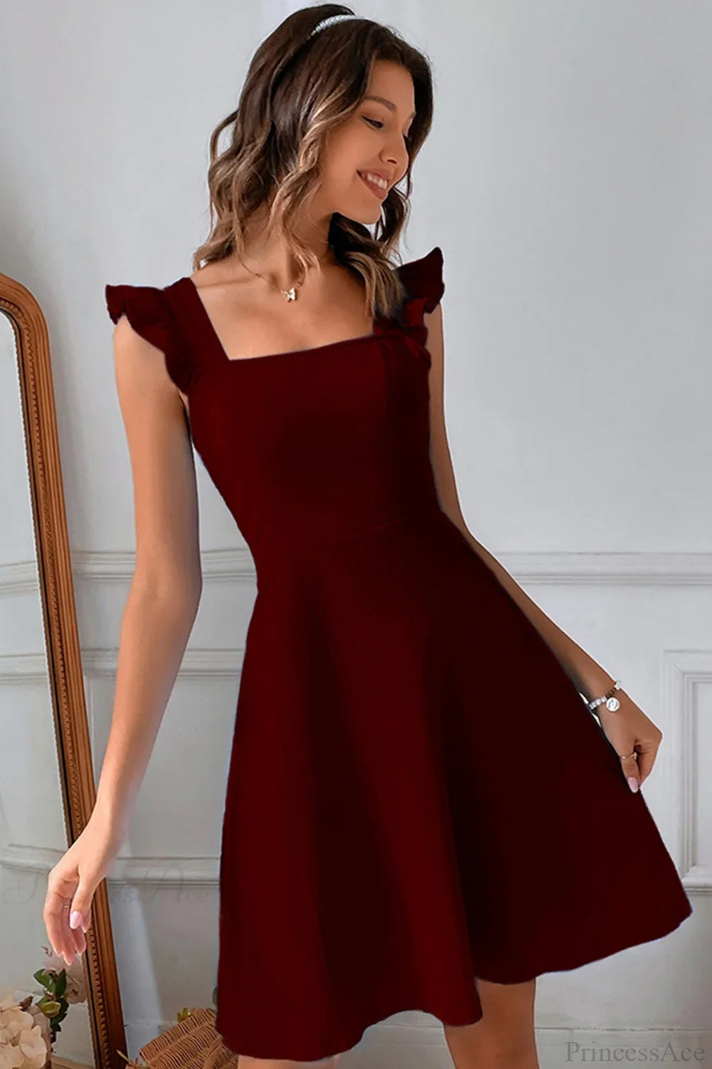 Bianca Sleeveless Mini Dress with Ruffle Tie-back